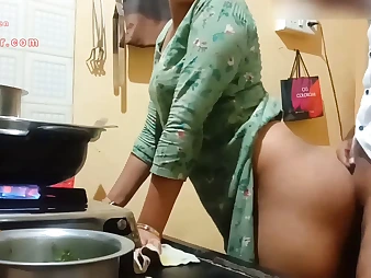 Observe this Indian Milf with a big booty get down and muddy in the kitchen